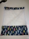 Filet de lavage en tissu coton avec des motifs de plumes