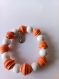 Bracelet  perles orangées 