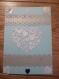 Carte double bleu avec des coeur blanc et gris et une décoration gris argenté pour la fetes des 