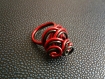 Bague aluminium couleur rouge et noire spirale 