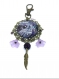 Porte-clef / bijou de sac galaxy violet et blanc - métal bronze