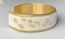 Bracelet jonc blanc et doré en perle de miyuki