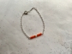 Bracelet chaîne argentée et perles oranges