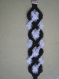 Bracelet en dentelle aux fuseaux blanc et noir