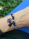 Bracelet ruban liberty au motif fleuri, noir, beige, violet et bleu, pompon et papillon aspect cristal violet