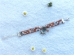 Bracelet ruban liberty au motif fleuri, marron orangé et beige, éléphant et perles