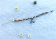 Bracelet ruban liberty au motif fleuri, jaune, vert, bleu et beige, pompon et médaillon 
