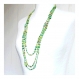 2 colliers * tourbillon vert en fleurs tropicales * verts, rouge, orange, jaune, blanc, et noir en perles rocailles