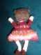 Petite poupée tricotée