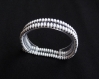 Bracelet blanc et gris