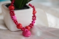 Bracelet perles avec têtes de mort roses