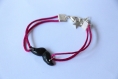 Bracelet moustache noire avec cordons roses