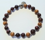 Bracelet en perles naturelles 6 mm : bois de noisetier, acajou et bois foncé