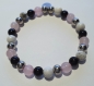 Bracelet en perles naturelles 6mm : quartz rose, onyx et howlite