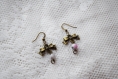 Boucles d'oreilles bronze - nœud et perle marbrée rose