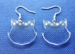 Boucles d'oreilles pendantes transparentes fait main.