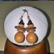 Boucles d'oreilles en graines naturelles : graines canique orange