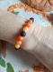 Bracelet de perles noir et orange en pierre de lave et en agate