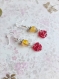 Boucles d'oreilles pendantes fleurs avec perles jaunes et roses rouges en résine