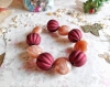 Bracelet de perles café et rouge ajustable