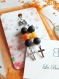 Boucles d'oreilles pendantes noir et orange en pierre de lave et en agate