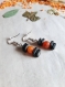 Boucles d'oreilles pendantes noir et orange en perle de coco et en agate