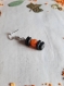 Boucles d'oreilles pendantes noir et orange en perle de coco et en agate