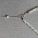 Collier dos perles de nacre naturelle de coquillages