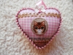 Coeur en tissu avec chat