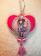 Décorations colorées de coeurs et plaques de porte avec la fillette santoro gorjuss