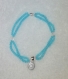 Exclusivité kassaora !! bracelet en perles bleu ciel double rangs pendentif rond strassé en argent