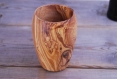 A pair of goblets made with olive wood