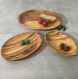 A set of 3 oval dishes made with olive wood