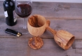 A pair of cups made with olive wood
