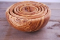 A set of six bowls made with olive wood