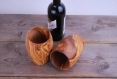 A pair of goblets made with olive wood
