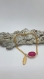 Bracelet fuchsia et plume