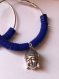 Créoles métal argenté inoxydable, perles heishi bleu foncé et tête de bouddha