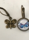 Set de barrette, bague et boucles d'oreilles asymétriques, papillon bleu