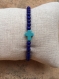 Bracelet perles bleu marine et croix turquoise