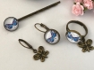 Set de barrette, bague et boucles d'oreilles asymétriques, papillon bleu