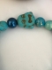 Bracelet en perles turquoise et tête de bouddha, pendentif bouddha et fleur