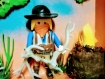 Cadre playmobil western, avec cowboy et décor de prairie