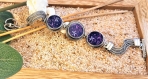 Bracelet boutons motif esquisse fleur violette