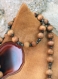 Parure collier et bracelet pour homme-noix de coco de couleur marron-perles en métal argenté modèle 
