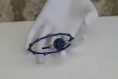 Bracelet s (monté sur fil à mémoire de forme) en perles de verre bleues modèle 