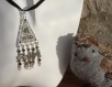 Parure sautoir pendentif-boucles d'oreilles métal argenté-swarovski quartz fumé modèle 