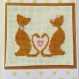 Carte brodée main à dessin de deux chats amoureux