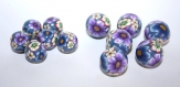 Perle polymère motif  fleuri dominate bleue , ronde 16mm / a l'unité.
