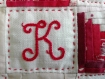 Tableau abécédaire patchwork et broderie 40x40 rouge/blanc